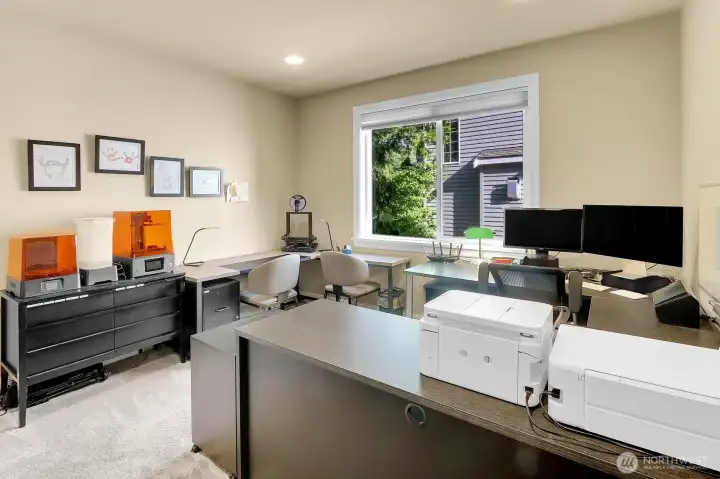 Main floor office with closet.
