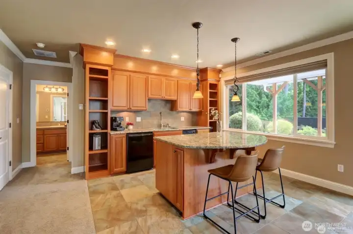 Lower Level MIL kitchenette (no stove) with two party eating bar.