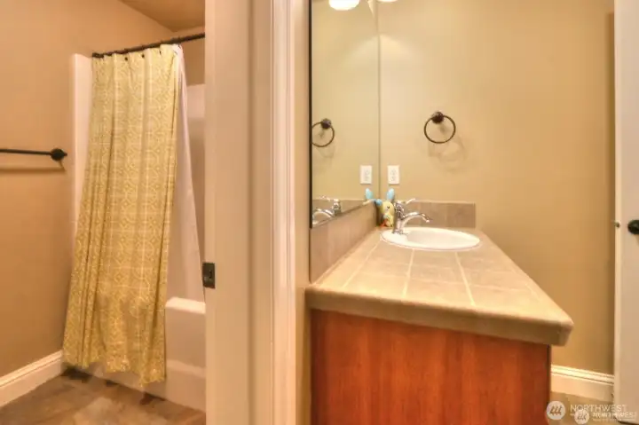 Lower level MIL apartment full bath.