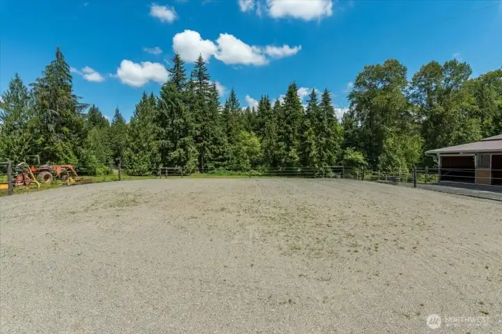 Outdoor arena directly off the run of stalls, wash rack and tack room.