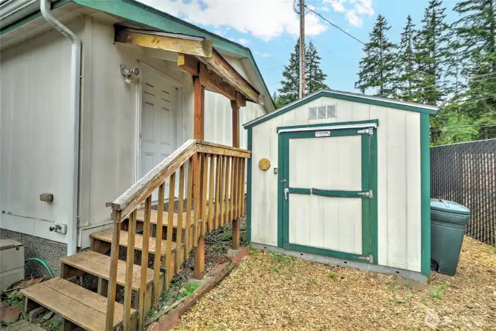 Backdoor and Outbuilding with workbench and additional storage