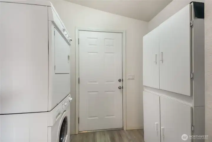 Utility Room with storage and backdoor