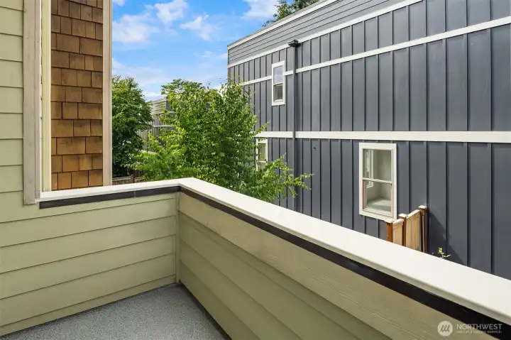 Main-level deck adjacent to the ding and living room.