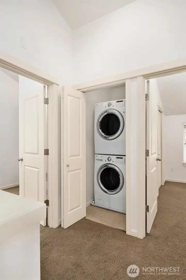 Upper-level laundry closet.