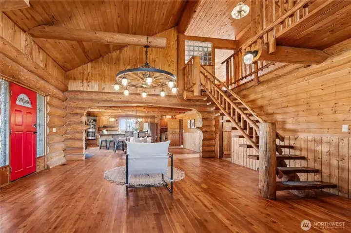 Heading up the grand staircase will take you to the primary bedroom