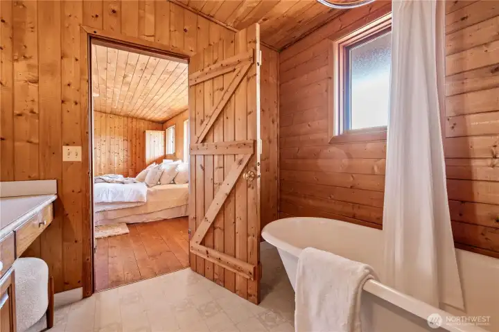The classic clawfoot tub invites relaxation