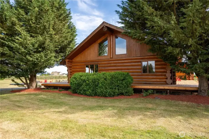 The generous wrap around deck goes around 3 sides of the house