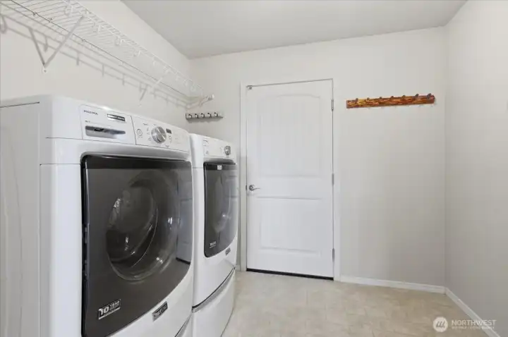Laundry and Utility Room opens to Garage.  Washer/Dryer Stay