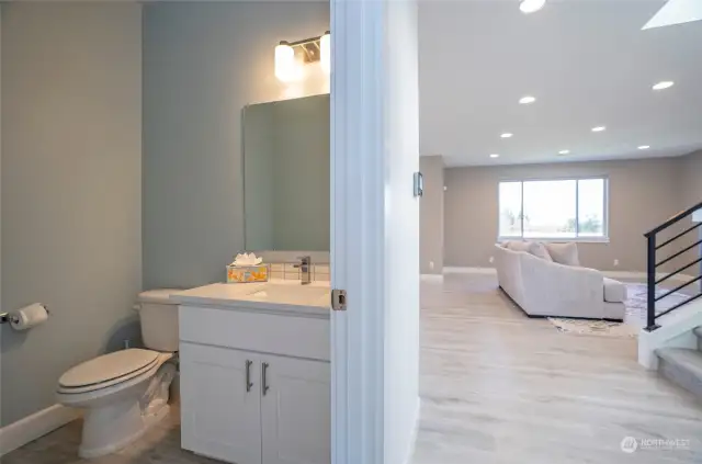 Conveniently located main-floor guest powder room.