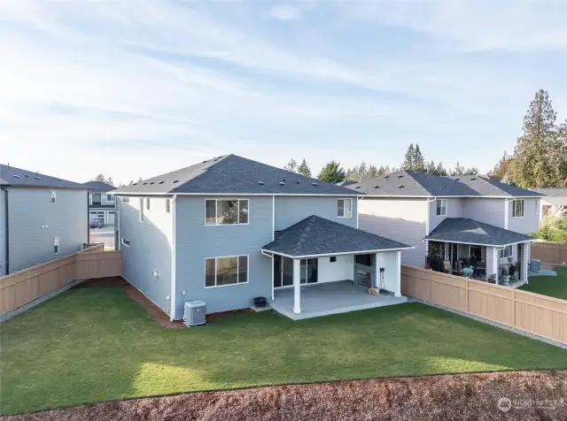 A stunning aerial view showcasing this beautifully fenced property.