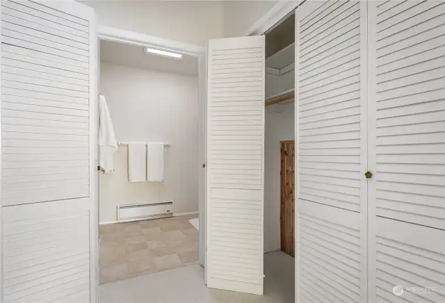 Cedar lined closets leading to bathroom