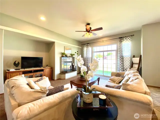 Living room with a slider to the patio