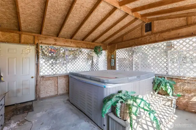 Covered Hot Tub (included in sale) off of Back Patio.