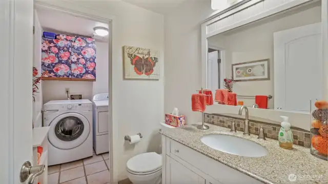 Convenient 3/4 bath on the main floor with direct access to the laundry room - Washer & Dryer stay!
