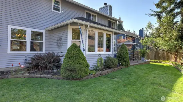 Lush greenery in the backyard creates a serene place!