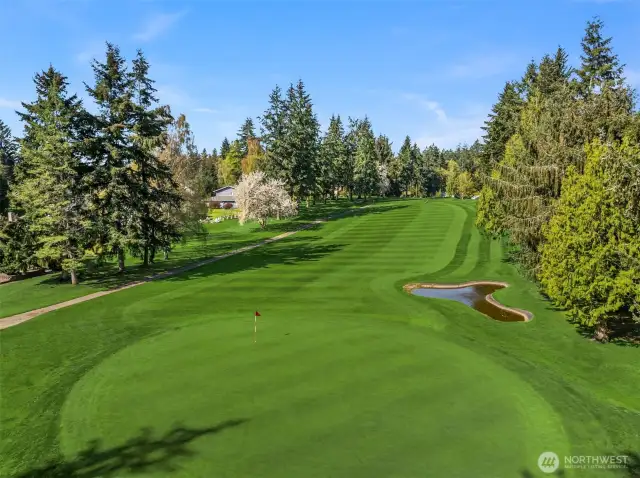 Nestled between two primary holes and minutes from Meadowmeer Club and Grill
