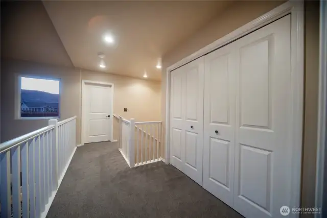 Upper floor has two separate primary suites with adjoining bath