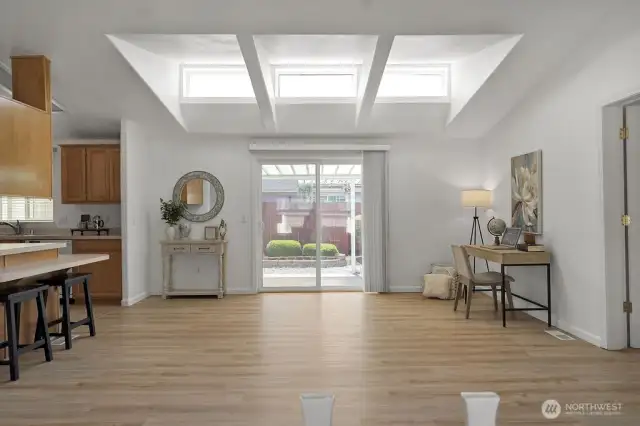 Lots of light open concept with space for a eating area.