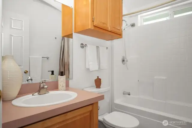 Full bathroom with bathtub