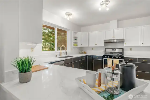 Countertop pass through from kitchen to dining adds to open living.
