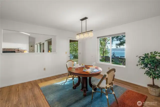 Views from the dining room and open to both the living room and the kitchen.