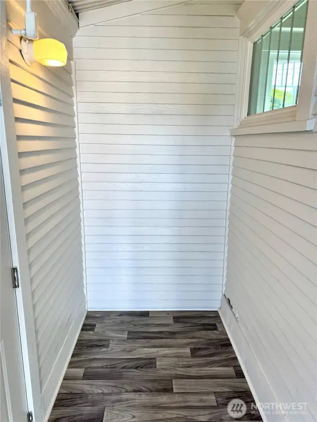 Nook between house and garage.