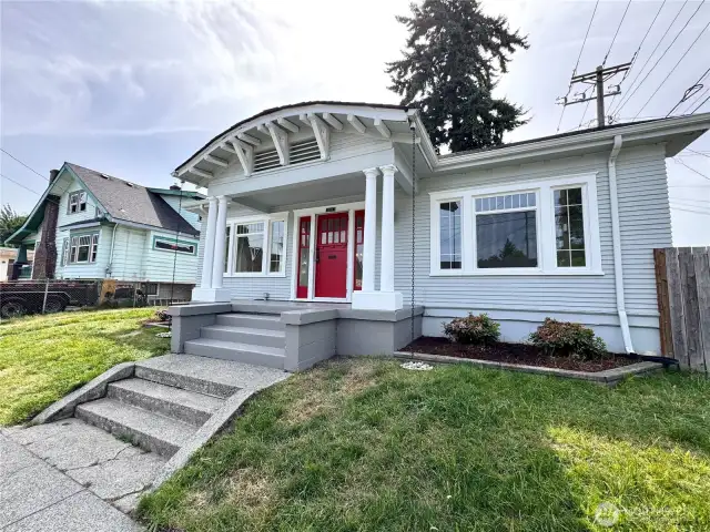 Welcome home! Check out all the detail and woodwork on that front porch!