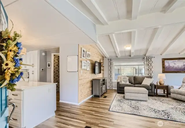 Lovely beams and wood accent wall.