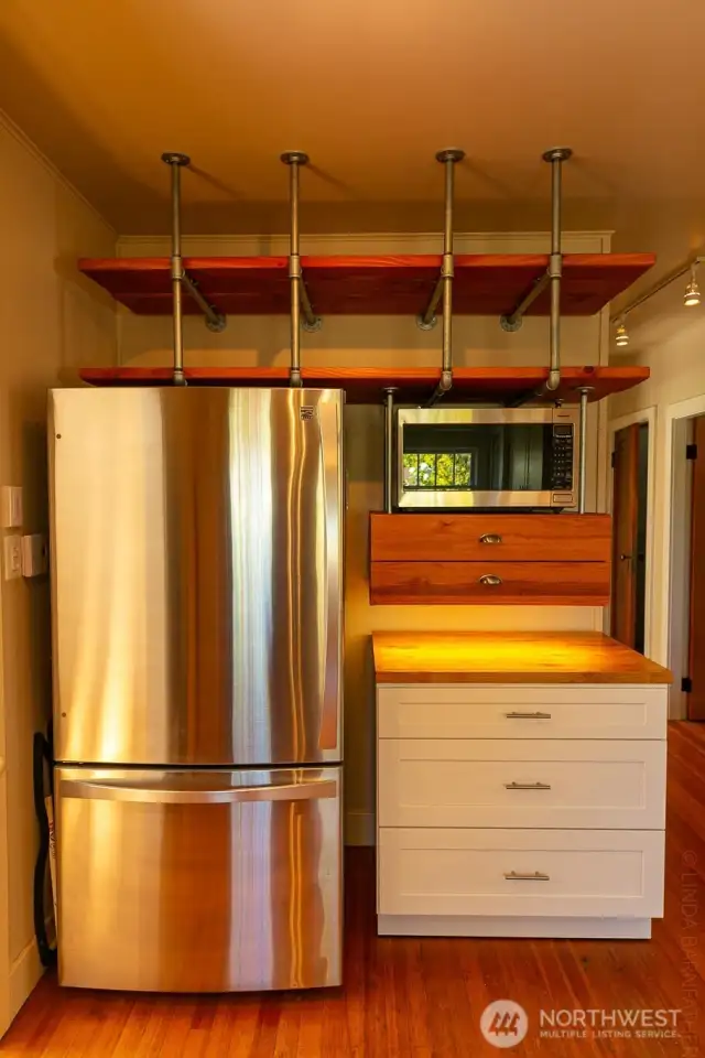 Open shelving provides plenty of storage and visual appeal.