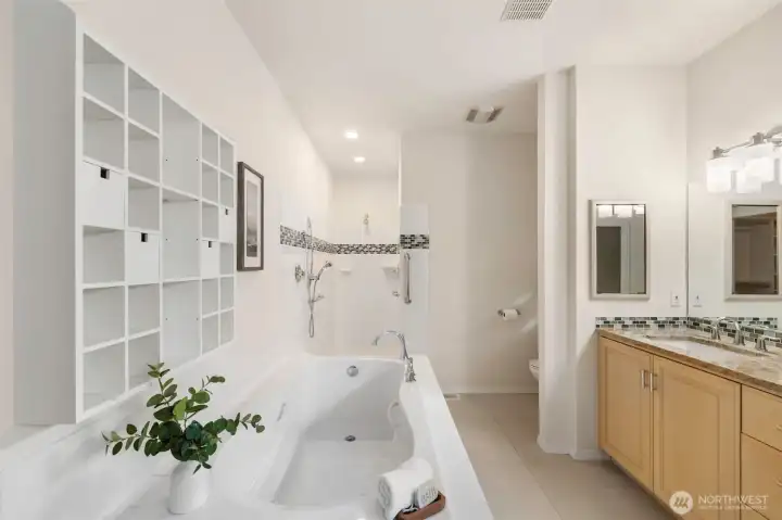 Lovely soaker tub and walk-in tile shower
