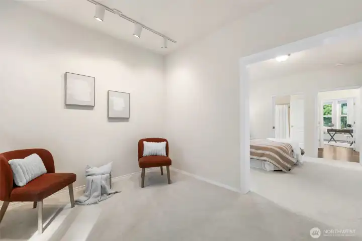 Additional sitting room off this bedroom has a sliding glass door to the patio
