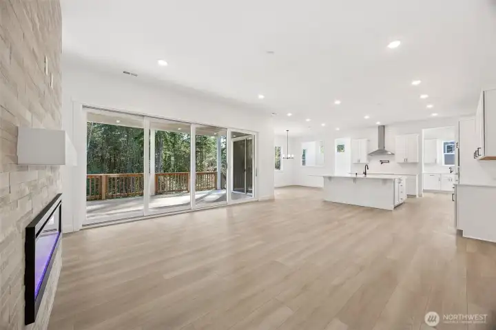 16' Multi-Slide Doors to Covered Patio  Photo from another home in the community- finishes will vary.