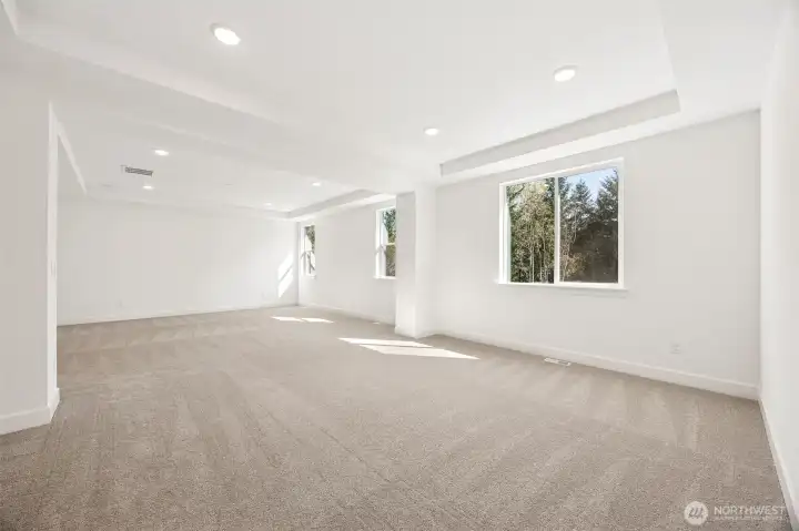 Large Primary Bedroom with Retreat  Photos are of another home in the community- finishes will vary.