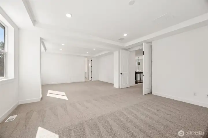 Large Primary Bedroom with Retreat  Photos are of another home in the community- finishes will vary.