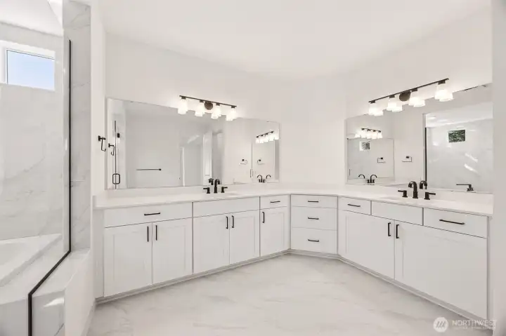 Primary Spa Bathroom  Photos are of another home in the community- finishes will vary.