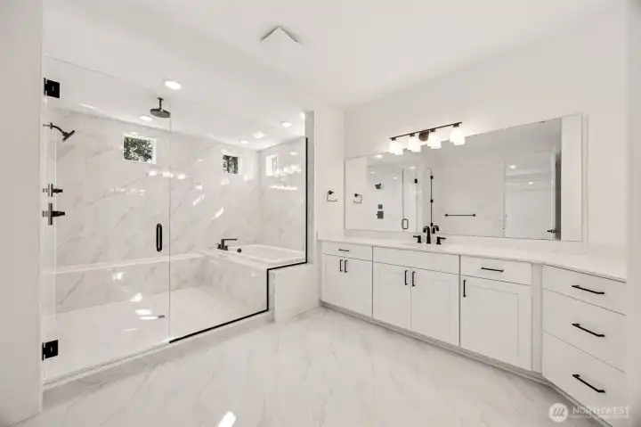 Primary Spa Bathroom  Photos are of another home in the community- finishes will vary.
