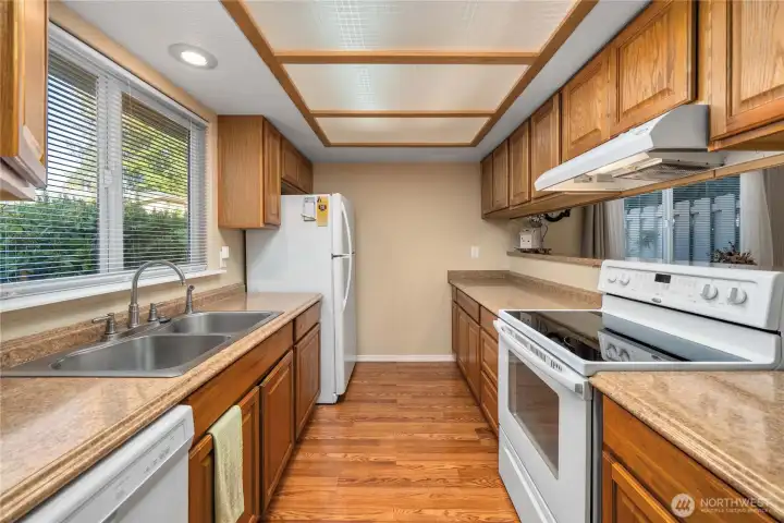 Original finishes with plentiful counter space and cabinetry for storage