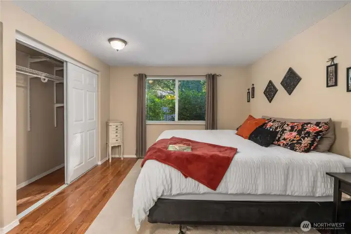 The second closet is hiding behind the door on the left, both closets are similar in size