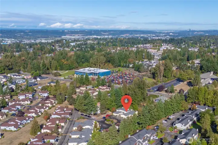 Conveniently located across from the YMCA (the big blue building), near schools, parks, transit, and Kent Station