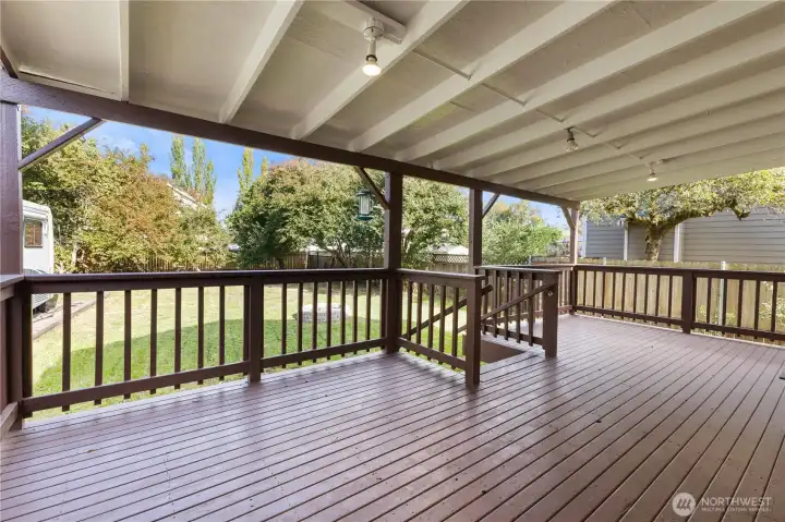 Expansive covered deck ideal for year-round entertaining.