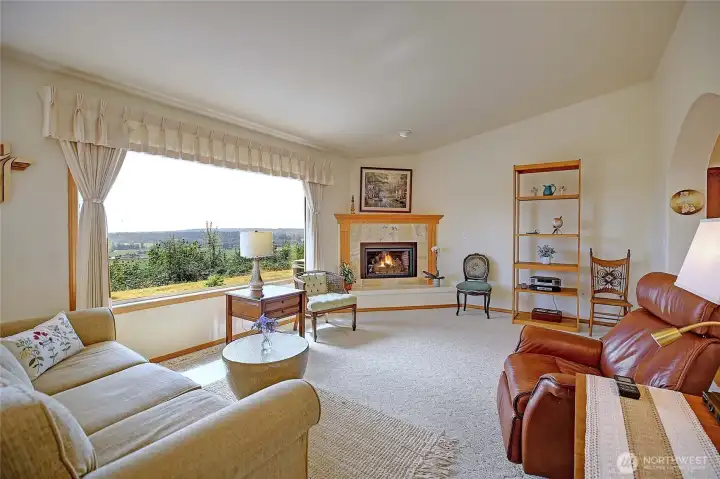 Expansive great room with propane fireplace and sweeping views!
