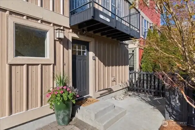 Newer exterior paint, and freshly painted front door