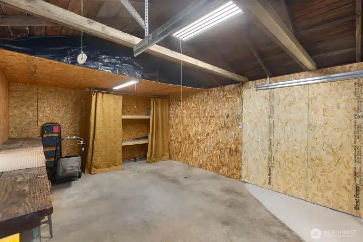 Clean and secure garage.  With room for parking storage and a project.