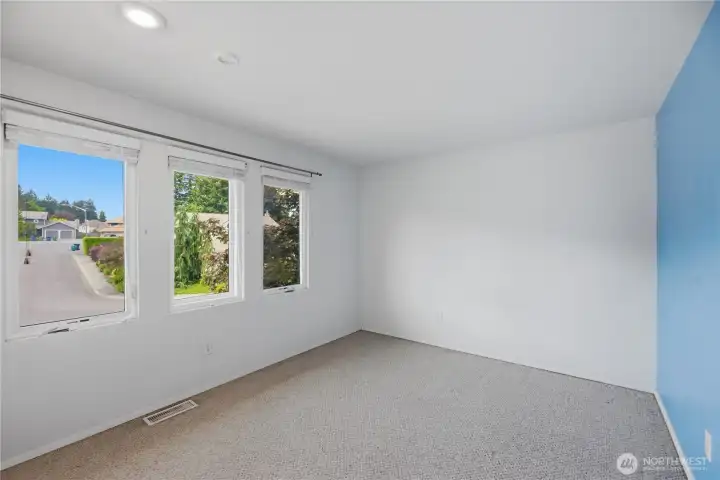 Bedroom next to top of stairs