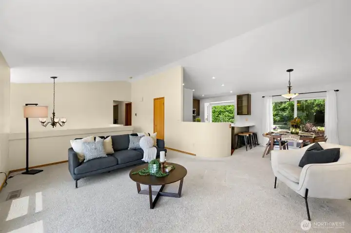 Notice the sliding glass doors that lead outside to your backyard retreat, just off the dining area. Notice the sliding glass doors that lead outside to your backyard retreat, just off the dining area.