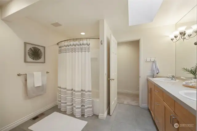 Tub/Shower in Hall Full Bath, with double sinks.