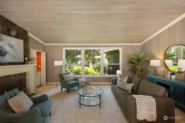 Magnificent clear cedar vaulted ceilings and walls frame the main living room.