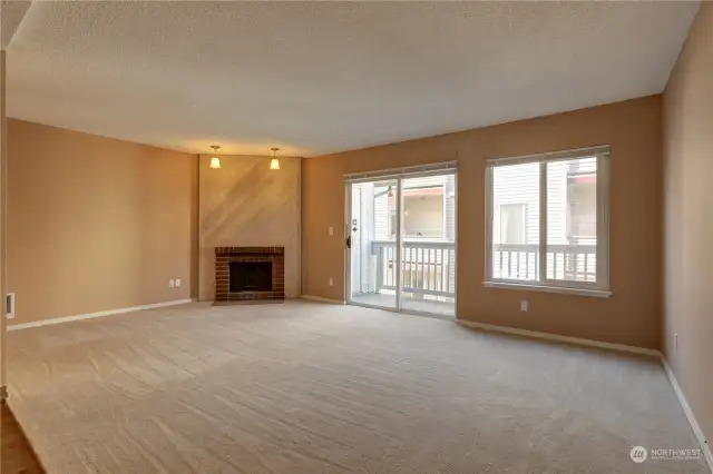 Large, open space living room w/ natural light