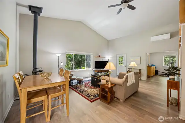 2nd Home - Living room shows ceiling fan and stove.