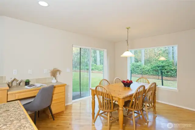 Super-sized kitchen nook with a slider to the back patio.